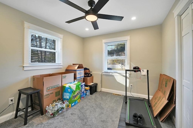 workout room with ceiling fan