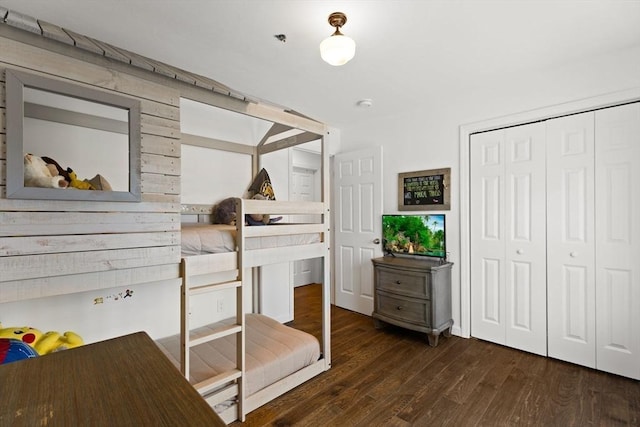 bedroom with a closet and wood finished floors