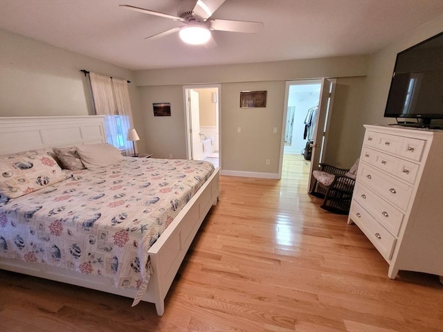 bedroom with baseboards, light wood-style floors, and a ceiling fan