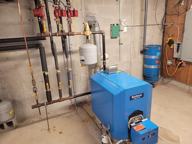 utility room featuring a heating unit