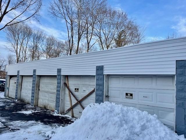 view of snow covered garage