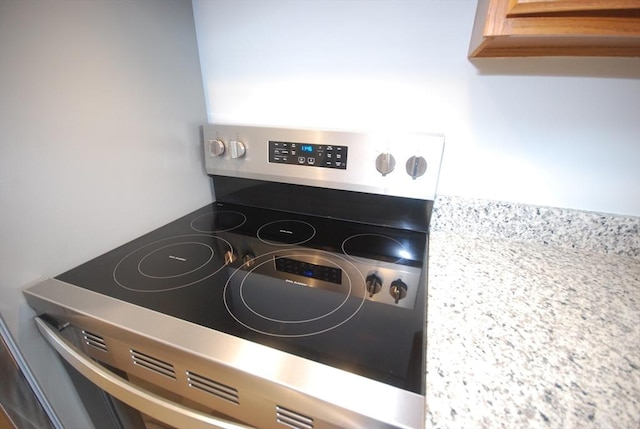 343 Chicopee St Unit 41, Chicopee, MA 01013 - kitchen view of electric range and light countertops