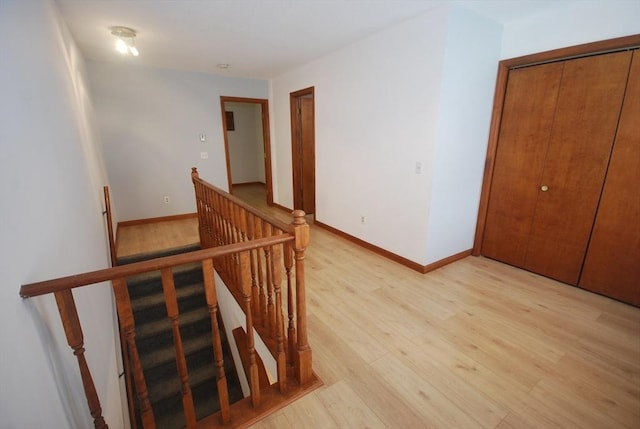 343 Chicopee St Unit 41, Chicopee, MA 01013 - staircase featuring wood finished floors and baseboards