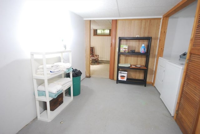 343 Chicopee St Unit 41, Chicopee, MA 01013 - interior space featuring washing machine and dryer, wood walls, and concrete floors