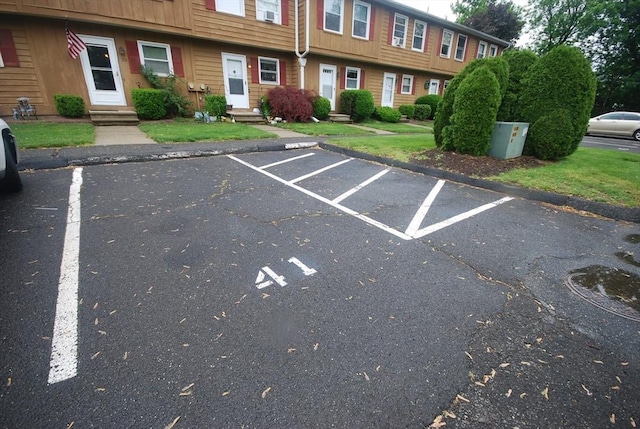 343 Chicopee St Unit 41, Chicopee, MA 01013 - uncovered parking lot featuring entry steps