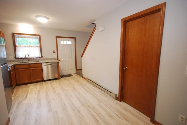 343 Chicopee St Unit 41, Chicopee, MA 01013 - kitchen with dishwasher, a baseboard heating unit, a sink, brown cabinetry, and light wood finished floors