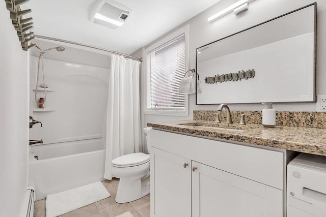 bathroom with washer / dryer, toilet, shower / bathtub combination with curtain, baseboard heating, and vanity