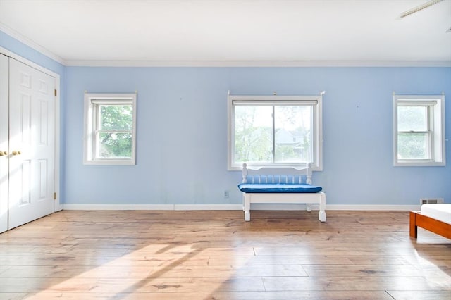38 Kimball Beach Rd, Hingham, MA 02043 - bedroom featuring ornamental molding, wood-type flooring, baseboards, and a closet