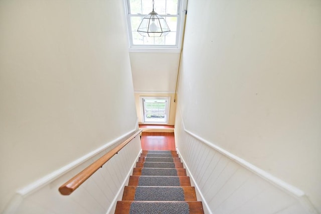 38 Kimball Beach Rd, Hingham, MA 02043 - staircase featuring wainscoting and wood finished floors