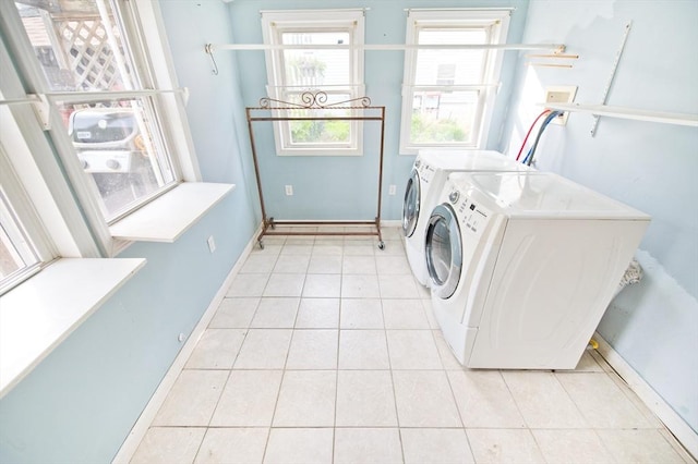 38 Kimball Beach Rd, Hingham, MA 02043 - laundry area with separate washer and dryer, light tile patterned flooring, and baseboards