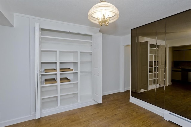 83 Horseshoe Dr Unit 83, Chicopee, MA 01022 - closet with baseboard heating