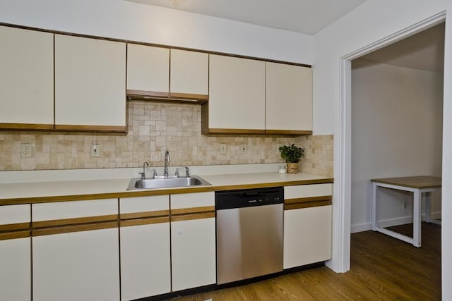 83 Horseshoe Dr Unit 83, Chicopee, MA 01022 - kitchen featuring stainless steel dishwasher, light countertops, white cabinetry, tasteful backsplash, and wood finished floors