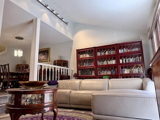 20 Meadowbrook Ln Unit 20, Palmer, MA 01069 - living room featuring vaulted ceiling and a chandelier