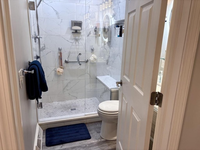 20 Meadowbrook Ln Unit 20, Palmer, MA 01069 - bathroom with a marble finish shower and wood finished floors