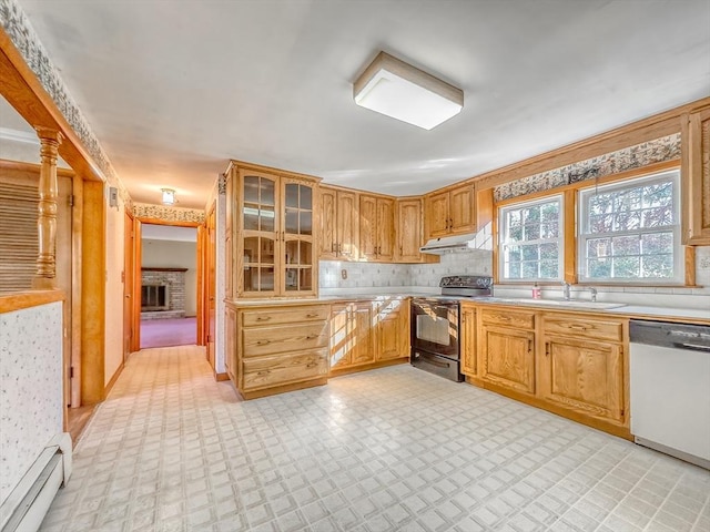 kitchen featuring tasteful backsplash, sink, a baseboard radiator, dishwasher, and black electric range oven