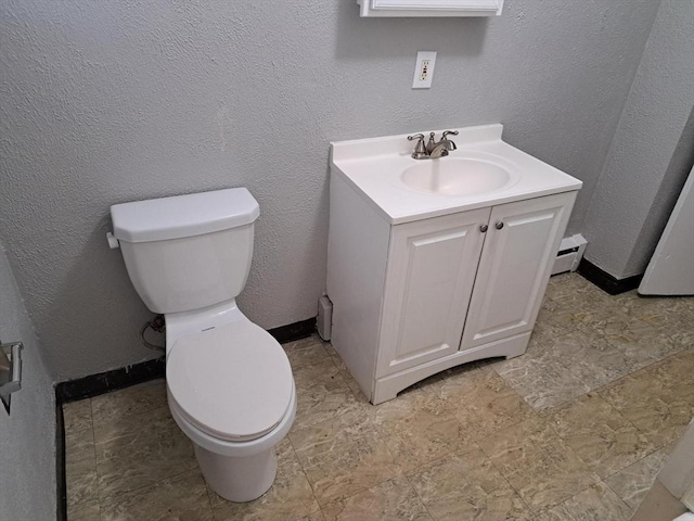 429 Mechanic St, Leominster, MA 01453 - bathroom featuring vanity, a baseboard radiator, and a textured wall
