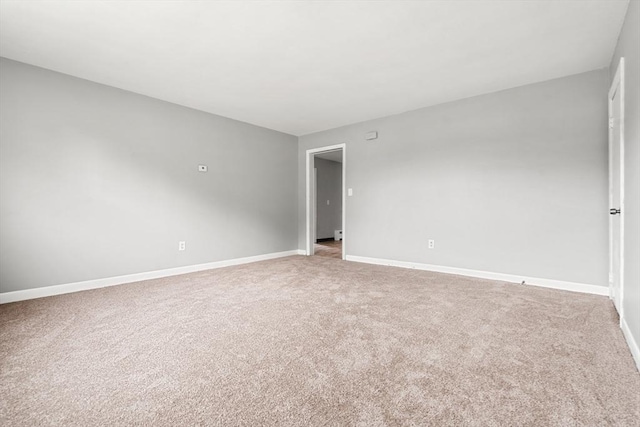 429 Mechanic St, Leominster, MA 01453 - carpeted empty room featuring baseboards