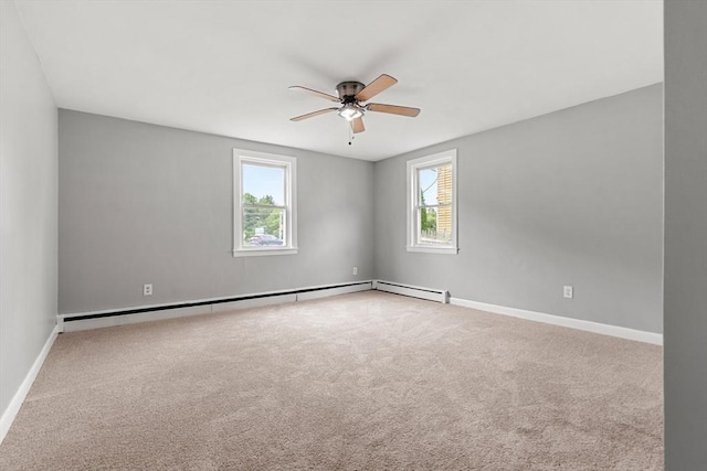 429 Mechanic St, Leominster, MA 01453 - carpeted spare room featuring a ceiling fan, plenty of natural light, and baseboard heating