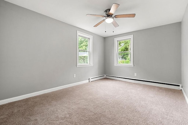 429 Mechanic St, Leominster, MA 01453 - carpeted spare room featuring a baseboard heating unit and a ceiling fan