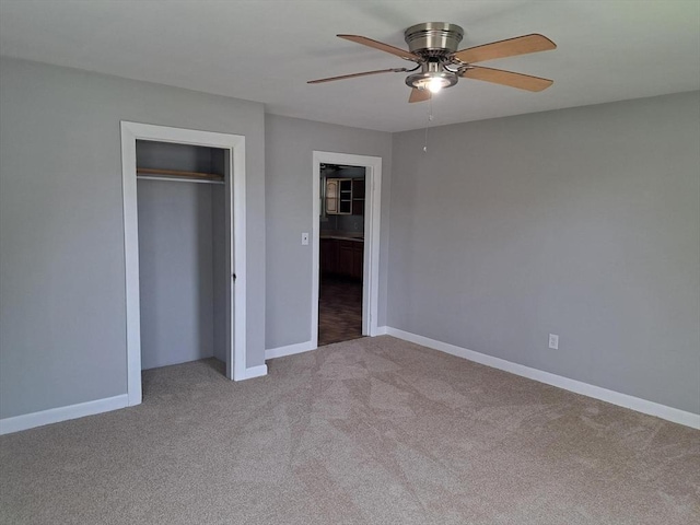 429 Mechanic St, Leominster, MA 01453 - unfurnished bedroom with light colored carpet, a closet, and a ceiling fan