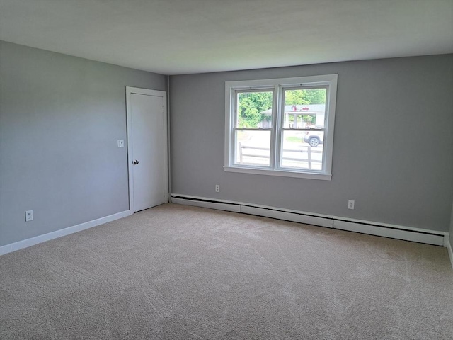 429 Mechanic St, Leominster, MA 01453 - empty room featuring baseboard heating and carpet floors