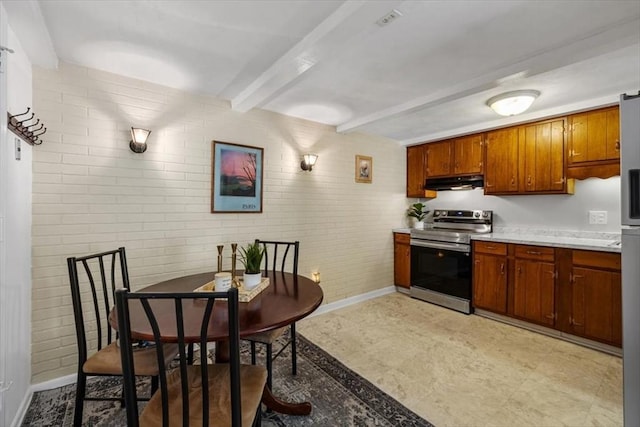 267 Neck St Unit 5A, Weymouth, MA 02191 - kitchen featuring stainless steel electric stove, brick wall, beamed ceiling, under cabinet range hood, and light countertops