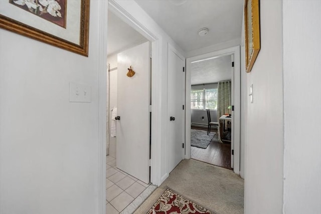 267 Neck St Unit 5A, Weymouth, MA 02191 - corridor featuring light colored carpet and light tile patterned flooring