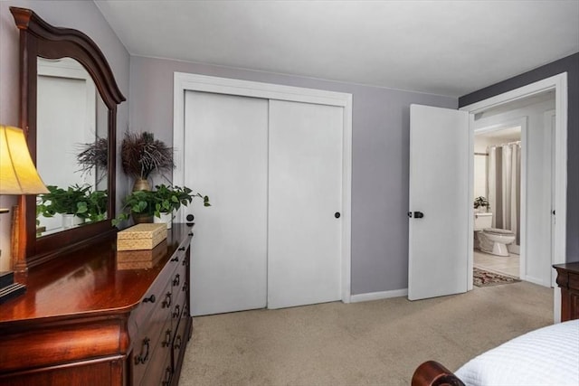 267 Neck St Unit 5A, Weymouth, MA 02191 - bedroom featuring a closet, carpet flooring, and baseboards