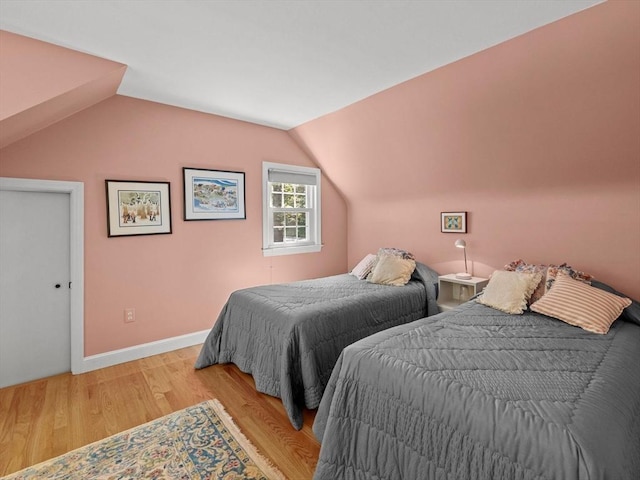 71 Nourse St, Westborough, MA 01581 - bedroom with light wood-style floors and lofted ceiling