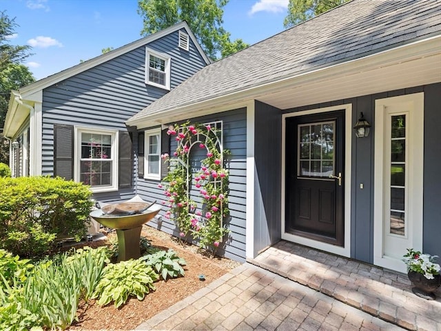 71 Nourse St, Westborough, MA 01581 - property entrance featuring roof with shingles and a porch