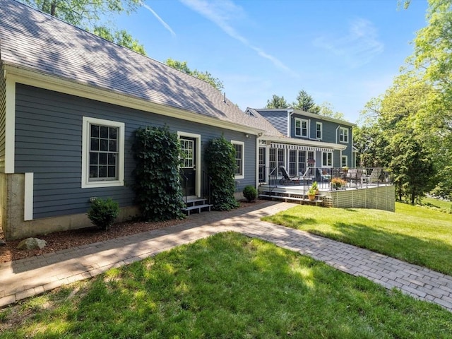71 Nourse St, Westborough, MA 01581 - back of house with a lawn and a sunroom
