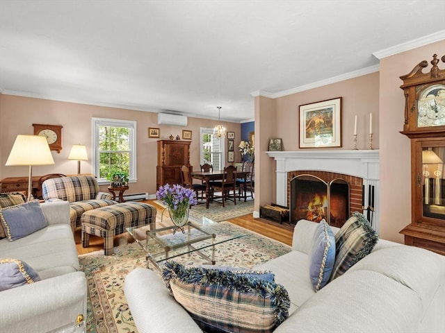 71 Nourse St, Westborough, MA 01581 - living room featuring a wall mounted air conditioner, wood finished floors, crown molding, and a fireplace