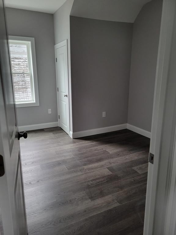 314-316 Dartmouth St, New Bedford, MA 02740 - unfurnished room with dark wood-style flooring and baseboards