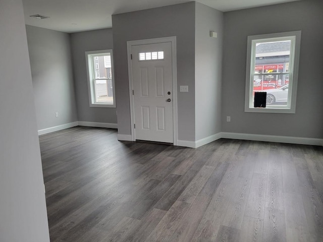 314-316 Dartmouth St, New Bedford, MA 02740 - entrance foyer with healthy amount of natural light, dark wood-type flooring, and baseboards