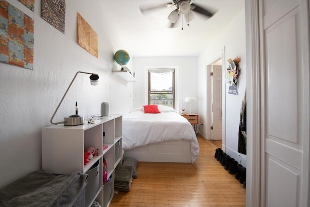 bedroom featuring light wood-style flooring