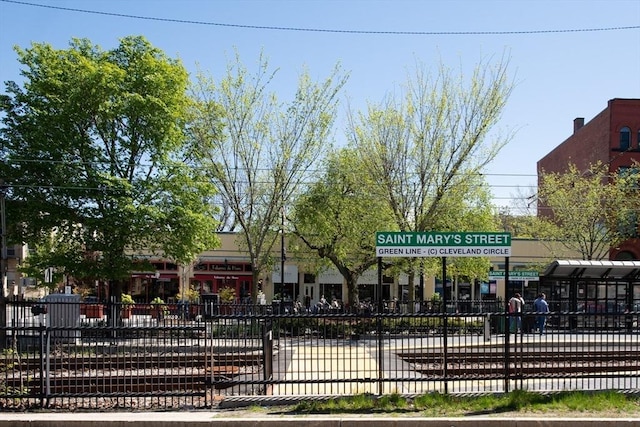 surrounding community featuring fence