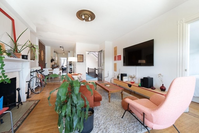 living area with wood finished floors