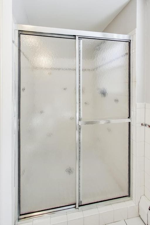 full bathroom with a stall shower