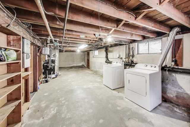 below grade area with washer and clothes dryer