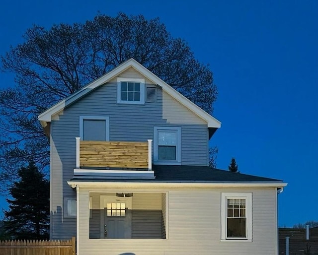 view of front of house with fence