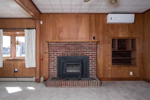 unfurnished living room featuring wood walls, carpet, a wall unit AC, and a baseboard radiator