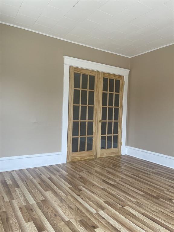 466-470 Cambridge St, Fall River, MA 02721 - unfurnished room with crown molding and wood finished floors