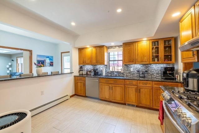 4 Fall St, Malden, MA 02148 - kitchen with appliances with stainless steel finishes, a sink, a baseboard heating unit, brown cabinets, and recessed lighting