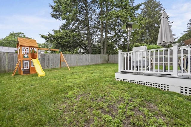 116 Pilgrim Rd Unit 116, Haverhill, MA 01832 - fenced backyard featuring a playground and a wooden deck