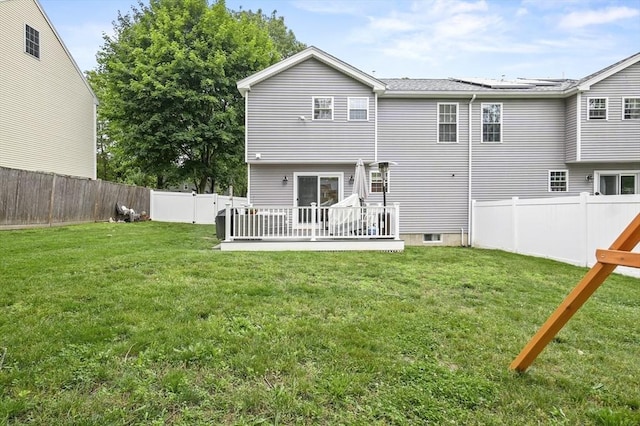 116 Pilgrim Rd Unit 116, Haverhill, MA 01832 - rear view of property with a fenced backyard and a wooden deck
