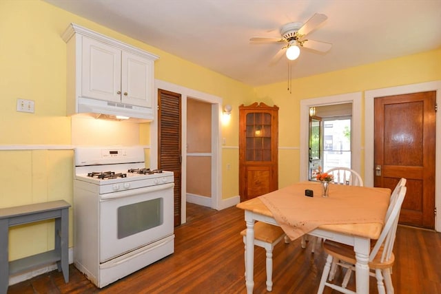 25 Maple Ave, Everett, MA 02149 - kitchen featuring white gas range, under cabinet range hood, white cabinetry, ceiling fan, and dark wood finished floors