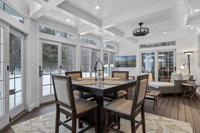 dining room featuring beamed ceiling, wood-type flooring, coffered ceiling, and french doors