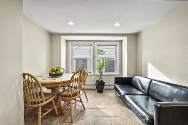 dining room featuring recessed lighting, a baseboard heating unit, and light tile patterned flooring