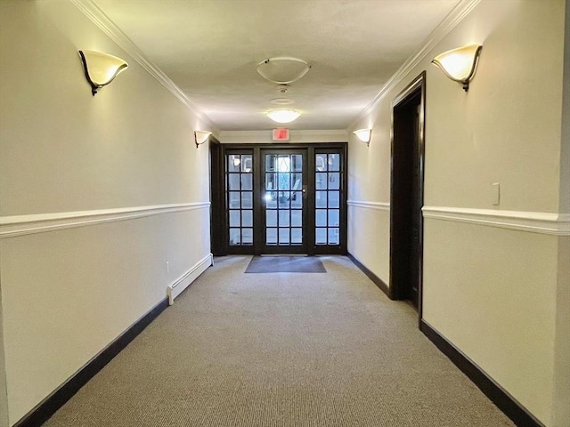 187 Great Rd Unit B2, Acton, MA 01720 - corridor featuring a baseboard heating unit, carpet flooring, ornamental molding, and baseboards