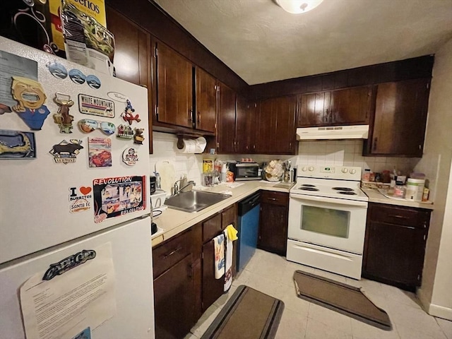 187 Great Rd Unit B2, Acton, MA 01720 - kitchen with white appliances, a sink, under cabinet range hood, light countertops, and decorative backsplash